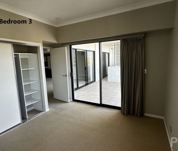 Stylish 3-Bedroom + Study Apartment in the Heart of Chermside - Photo 3