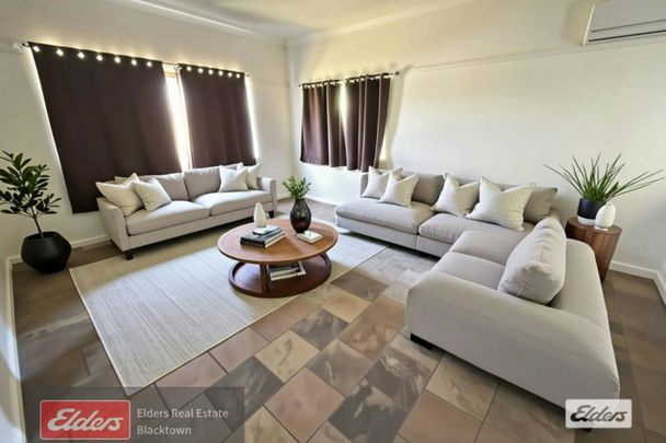 Beautifully Updated Home Close to All Essentials - Photo 1