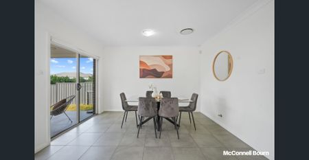 Discover Contemporary Family Living with Potential for Five Bedrooms & Versatile Living Spaces - Photo 2
