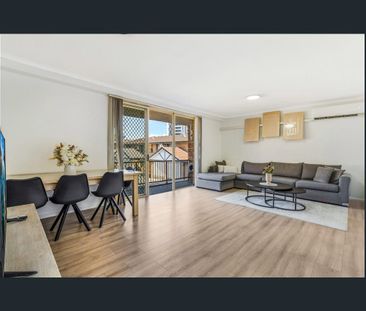 FIRST FLOOR APARTMENT WITH A DOUBLE LOCK UP GARAGE - Photo 1