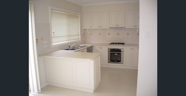 Low maintenance home in a great location - Photo 1