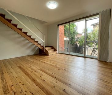 Spacious, Renovated 2 Bedroom Townhouse - Photo 1
