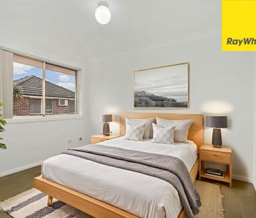 MODERN TOWNHOUSE IN A SMALL COMPLEX - Photo 1