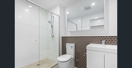 MODERN SPLIT-LEVEL APARTMENT IN A PRIME LOCATION! - Photo 2