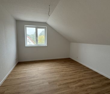 Obergeschosswohnung in einem charmanten Doppelhaus im Hörneweg! - Photo 1