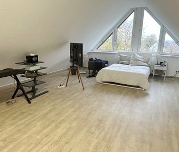 Großzügige Maisonette-Wohnung mit Kamin und 2 Balkonen! - Foto 4