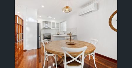 **Charming 4-Bedroom Colonial Home with Separate Modern Studio in Bardon** - Photo 3