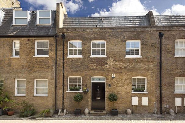 Stylish, well designed 3 bedroom mews house, with a charming terrace garden. - Photo 1