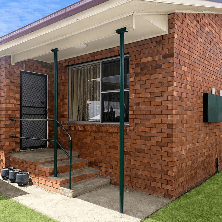 Neat Two Bedroom Unit - Photo 2